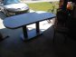 Dinning Table with Six Upolstered Metal Frame Chairs.